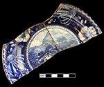 Pearlware small plate  printed underglaze in dark blue.  The continuous repeating floral border, which features camellia and daisy type flowers, is reverse printed.  Printed mark  “Views in Glengyle” from Select Scenery Series.  Impressed James and Ralph Clews (1818-1834) mark. 6.5” rim diameter, .75” vessel height.